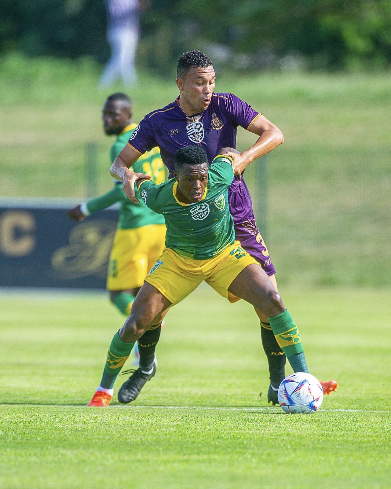 Nkosi shielding the ball from a defender